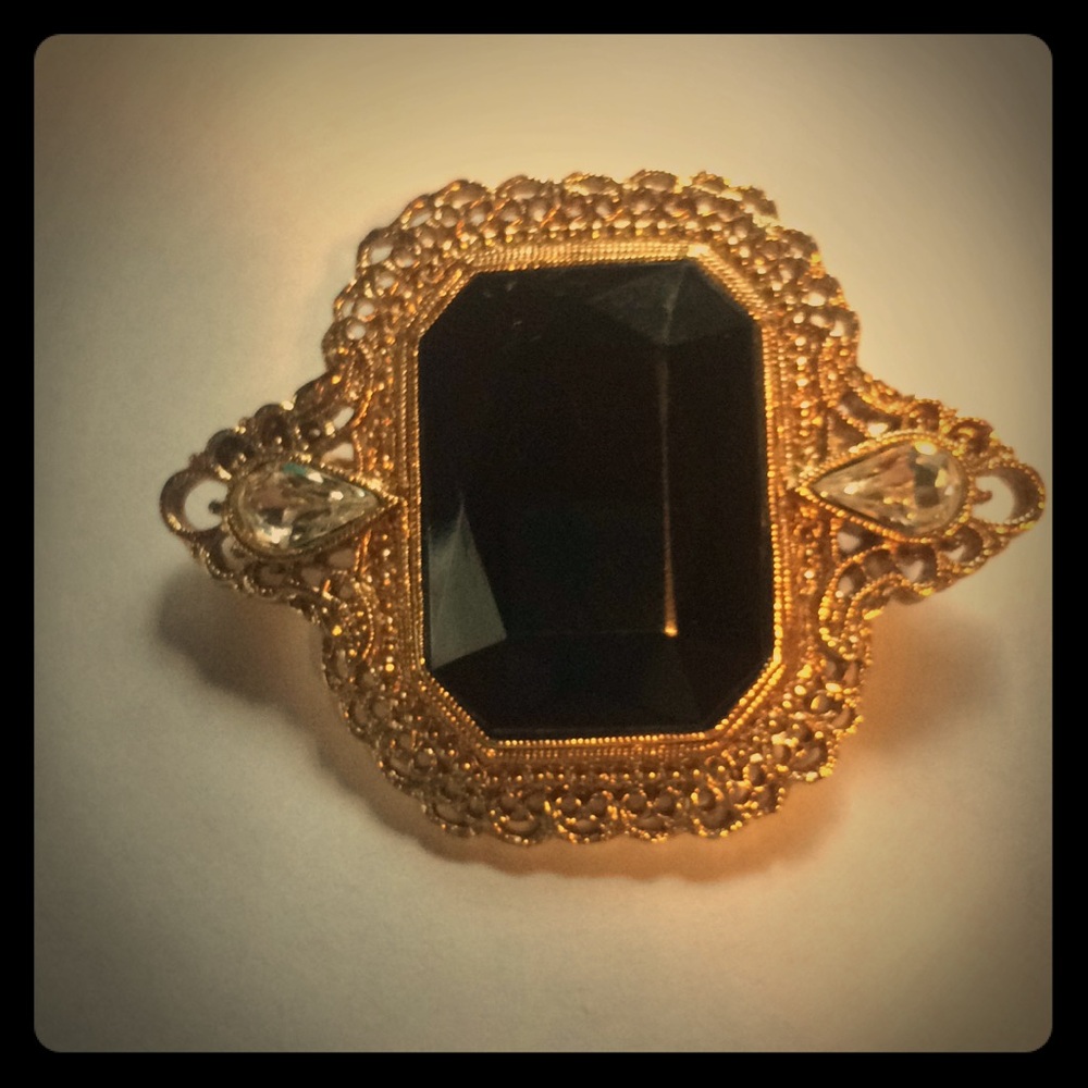 Goldstone 1928 brooch